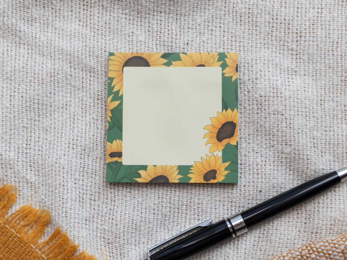 Sunflower Sticky Notes next to pen