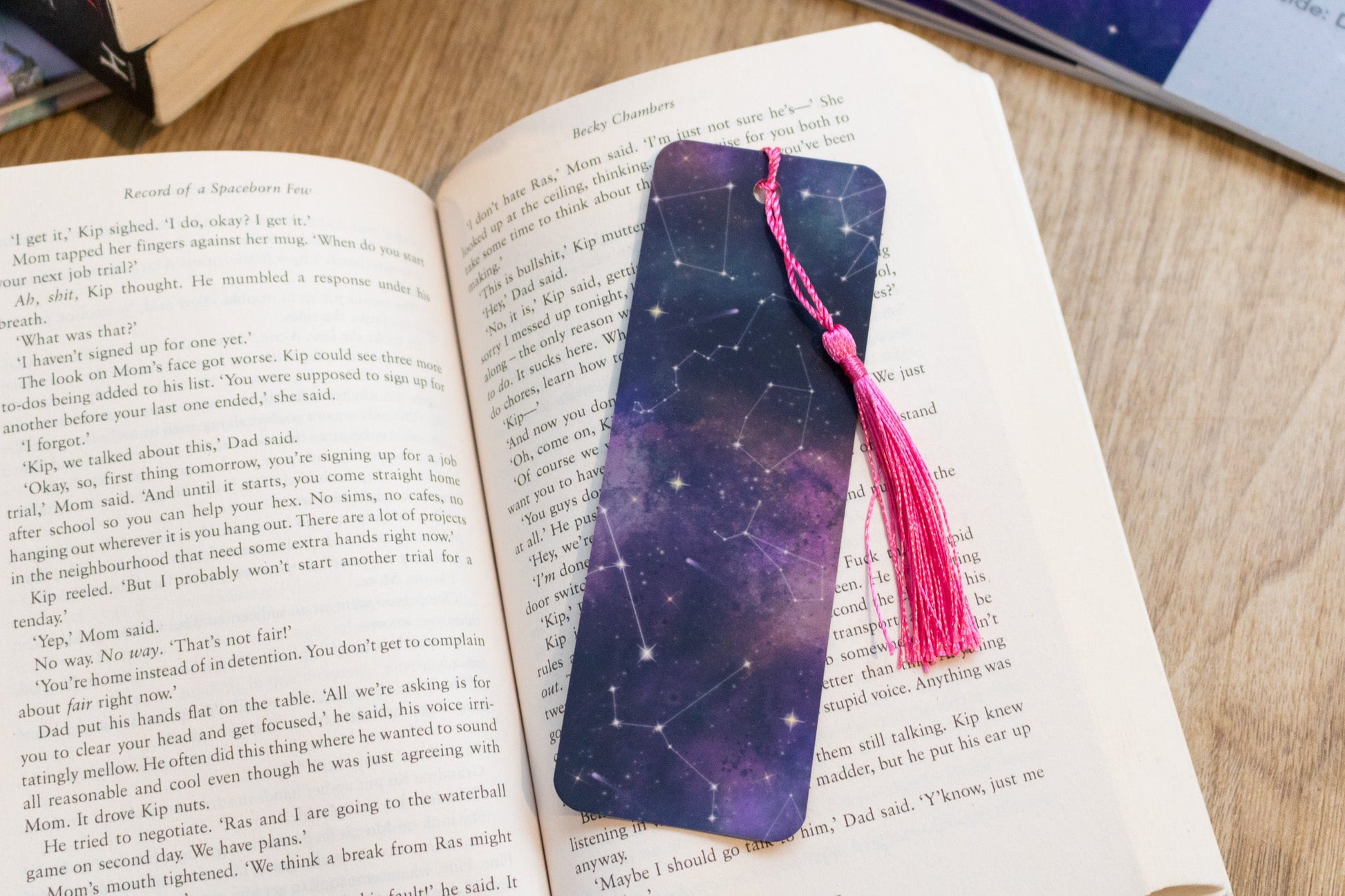 Cosmic Bookmark with pink Tassel - in book