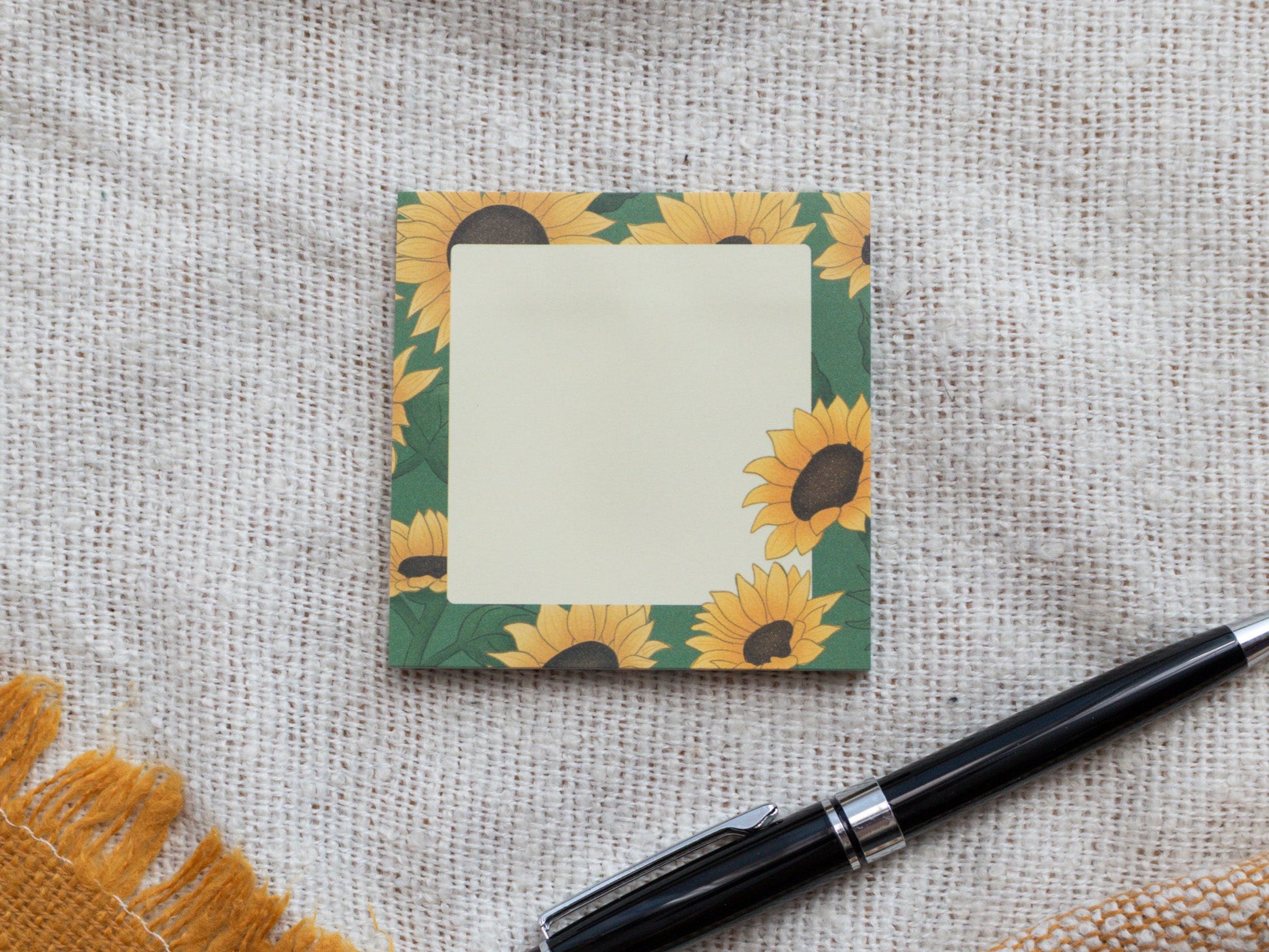 Sunflower Sticky Notes next to pen