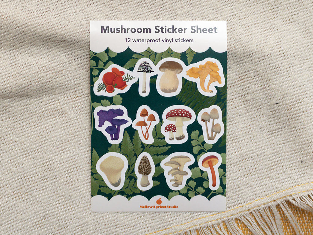 Mushroom sticker sheet on a textured fabric background