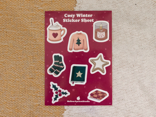 Cosy Winter Sticker Sheet with various winter-themed stickers on a red card.