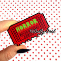 Brooch of a 50's horror movie ticket